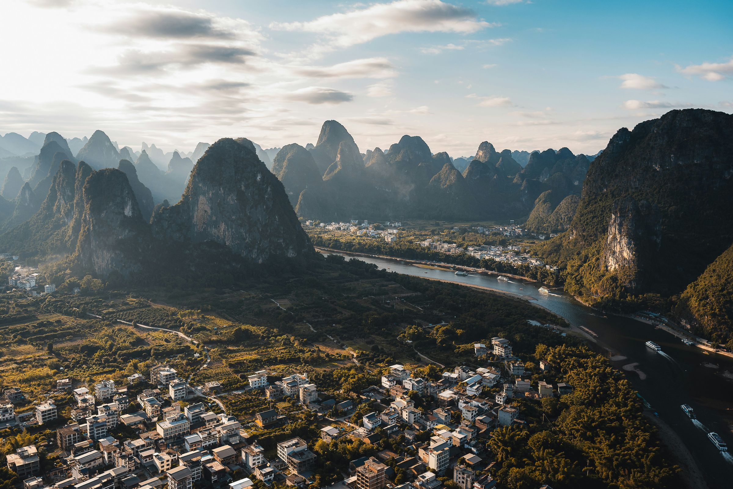 Karst peaks over the Li River and the town of Xingping at golden hour